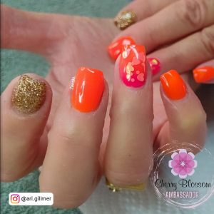 Bright Orange Stiletto Nails