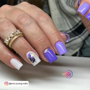 Gold And Purple Nail Art