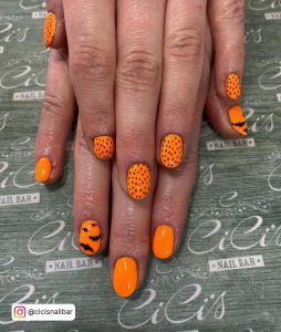 Matte Black And Orange Halloween Nails