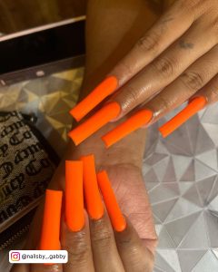 Matte Dark Orange Nails