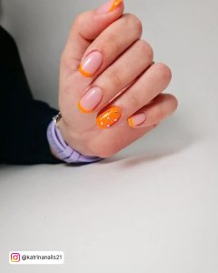 Neon Orange And Black Nails