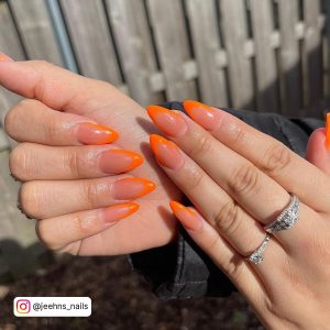 Neon Orange French Tip Nails