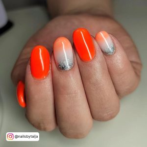Neon Orange Nails With Designs