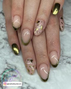 Nude And Gold Glitter Nails