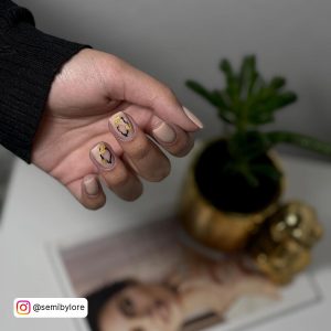 Nude And Gold Nail Designs
