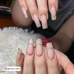 Nude Nails With Gold Tips