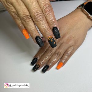 Orange And Black Glitter Nails