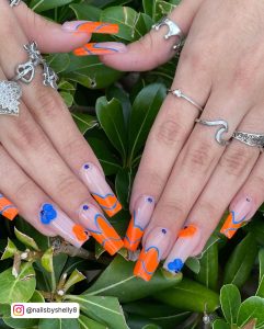 Orange And Blue Marble Nails