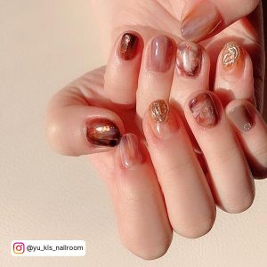 Orange And Brown Glitter Nails