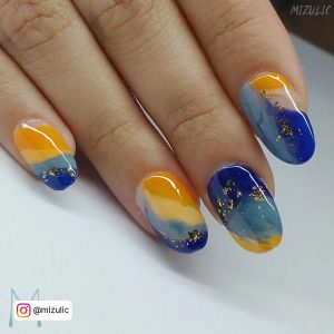 Orange And Light Blue Nails