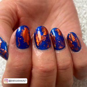 Orange Blue And White Nails