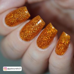 Orange Coffin Nails With Glitter