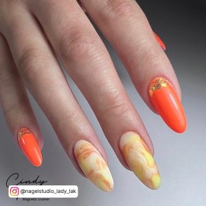 Orange Nails With Design