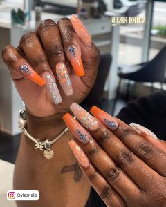 Pastel Orange Acrylic Nails