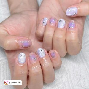 Pastel Purple And Yellow Nails