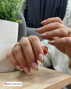 Red Nails With Gold French Tip