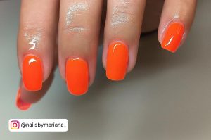 Short Bright Orange Nails