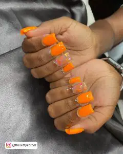 Short Neon Orange Nails