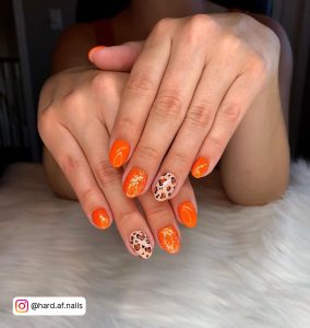 Short Orange Nails Design