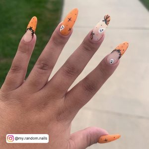 White And Orange Halloween Nails