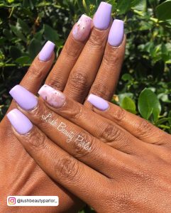 White And Purple Marble Nails