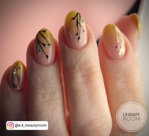 Yellow Ombre Nails With Designs